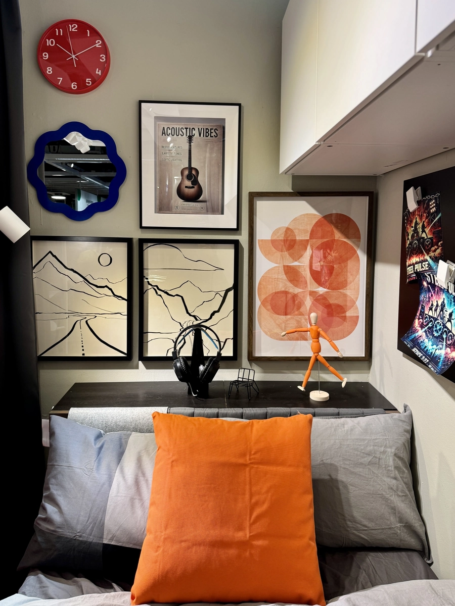 Gallery wall over the bed