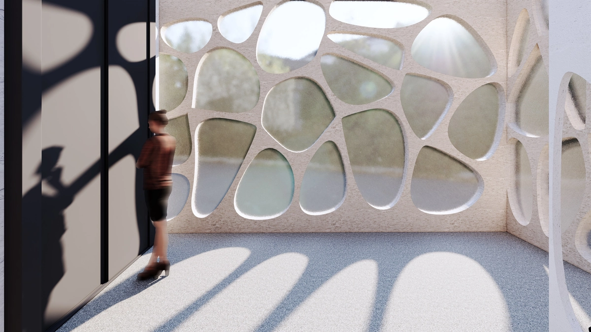 Upper floor: a screen of organic openings, glazed, with its shadow on the floor