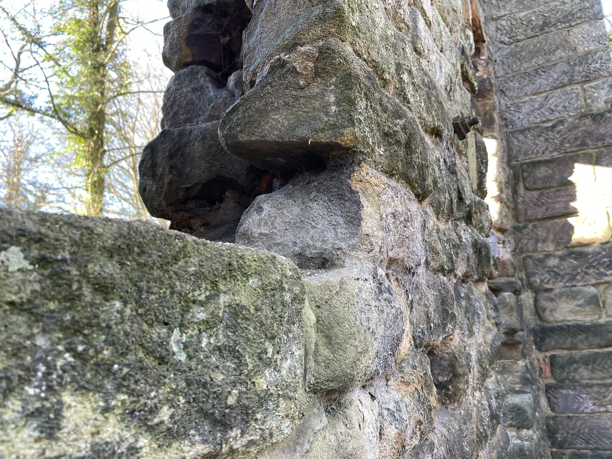 Large stones at the edge of an opening